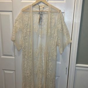 Woman’s swim cover up size M